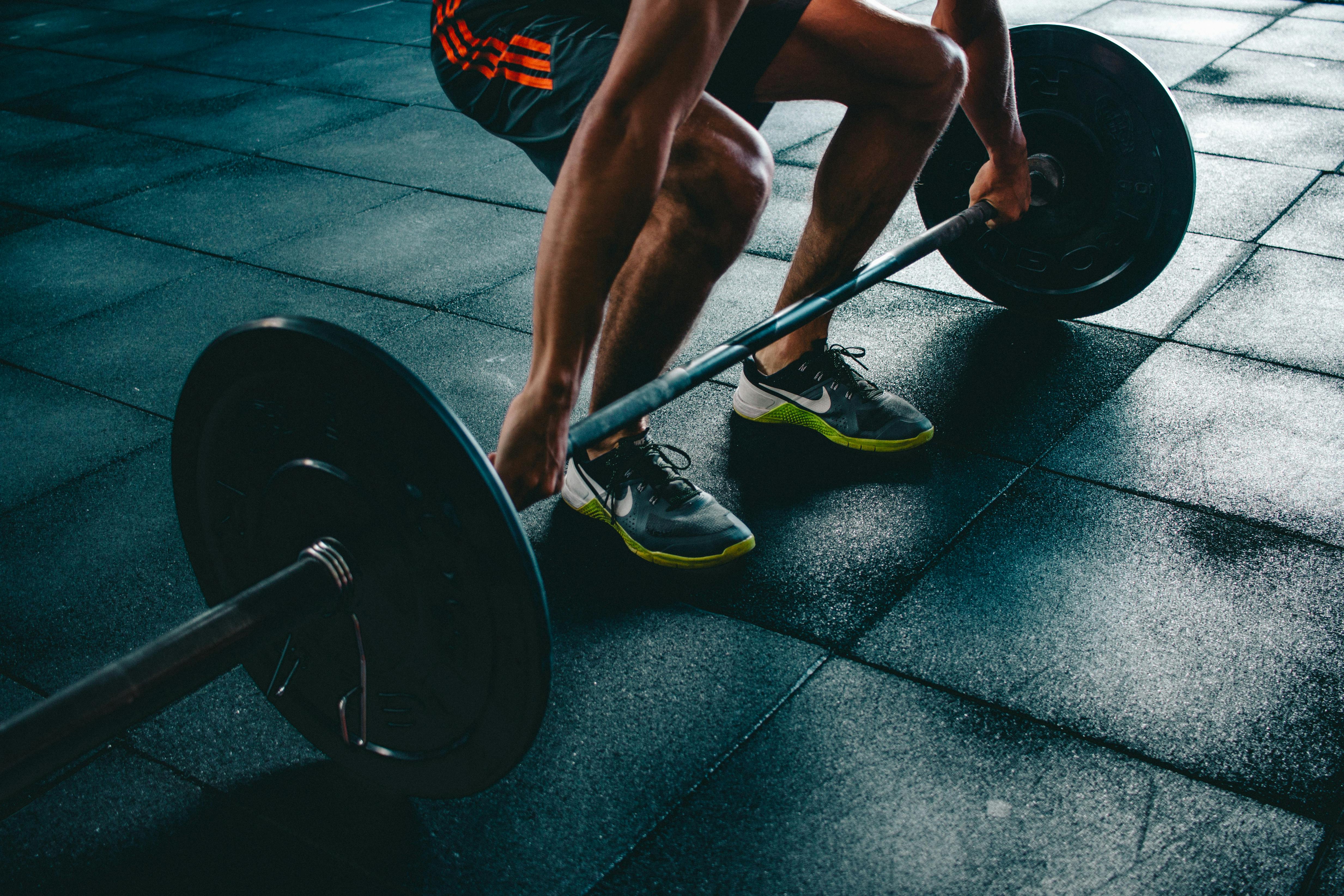 an arm grasping a kettlebell